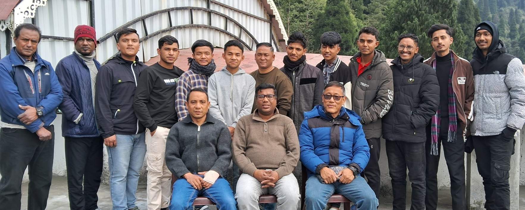 Recent picture of Pastors Mhontsen Lotha, Pradeep Kumar, a faculty member, and some students of Darjeeling Bible Training Center in West Bengal state.