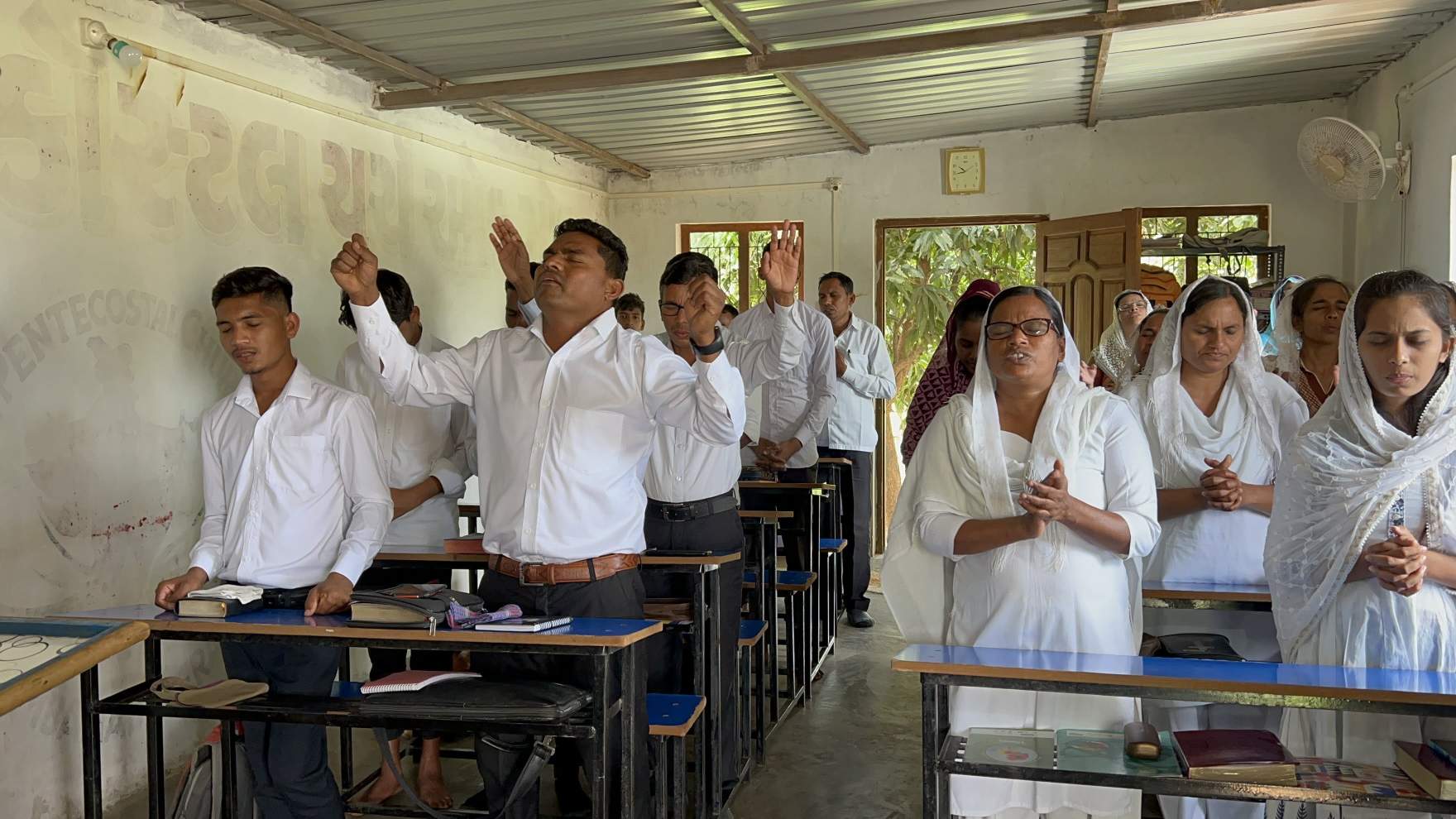 Worship of God precedes a morning class at Gujarat Bible Training Center.
