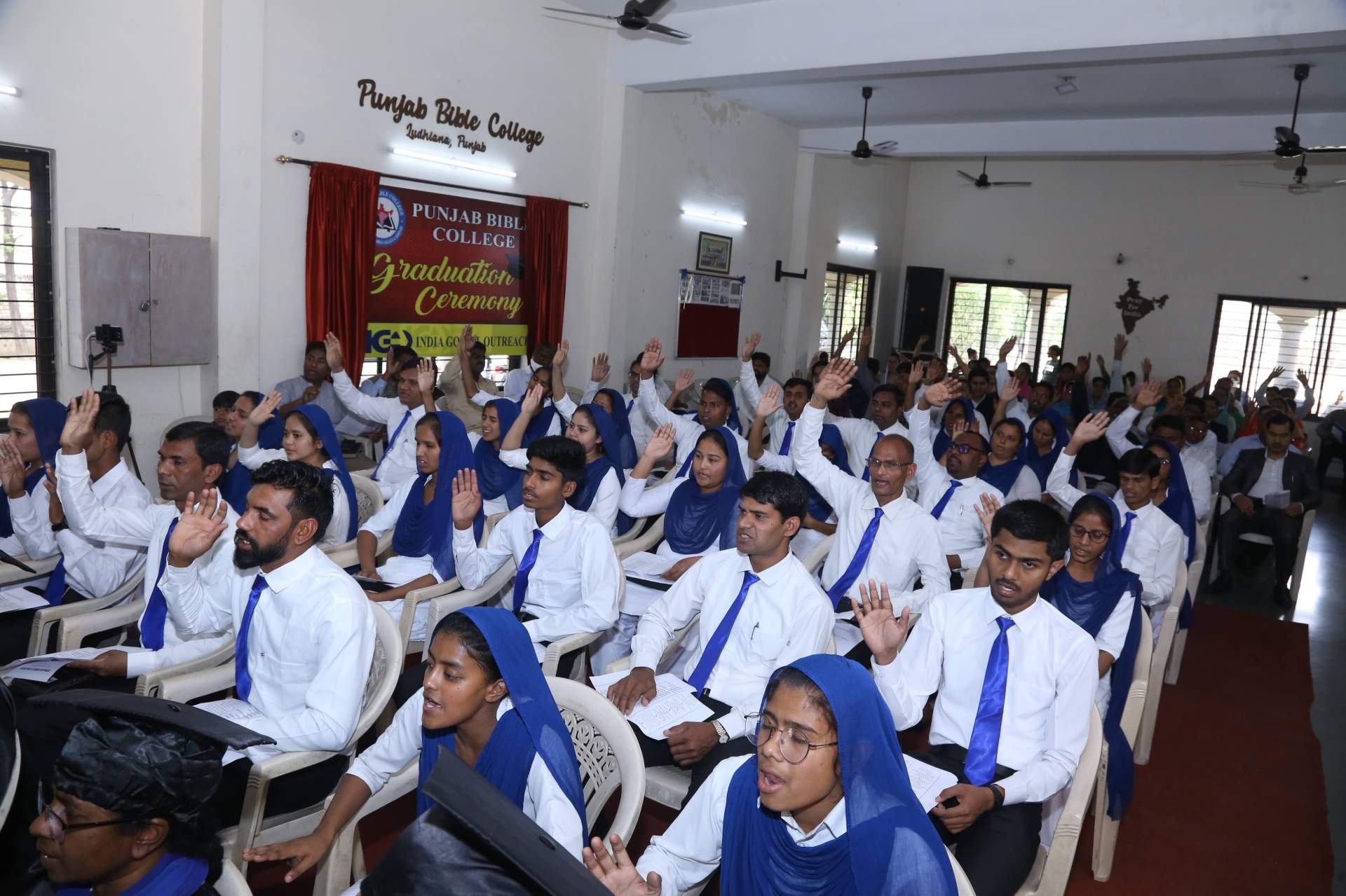 Graduates from Punjab Bible College commit their lives to preaching the gospel at their graduation service this past March.